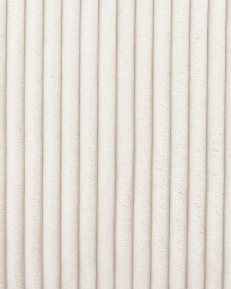 Close-up of a textured white surface with horizontal lines