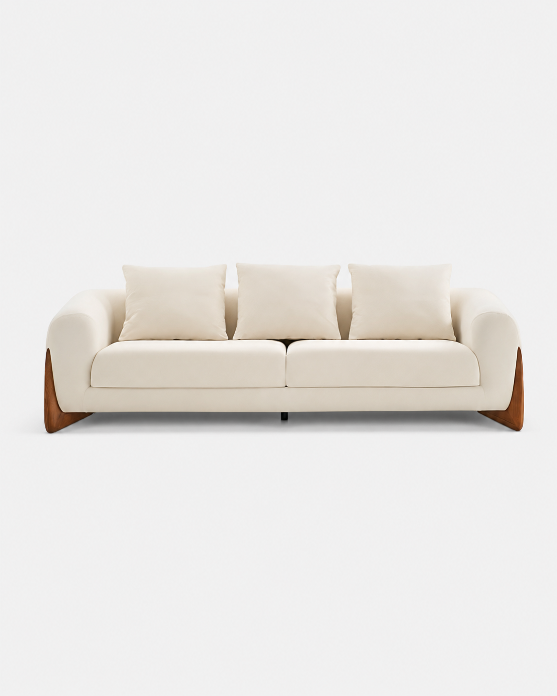 A modern three-seat sofa upholstered in warm off-white fabric with three matching back cushions and angled wooden legs, shown against a plain light gray background.