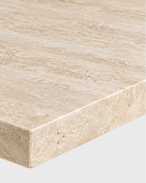 Close-up of a light beige travertine stone table top and matching pedestal base against a clean white background.